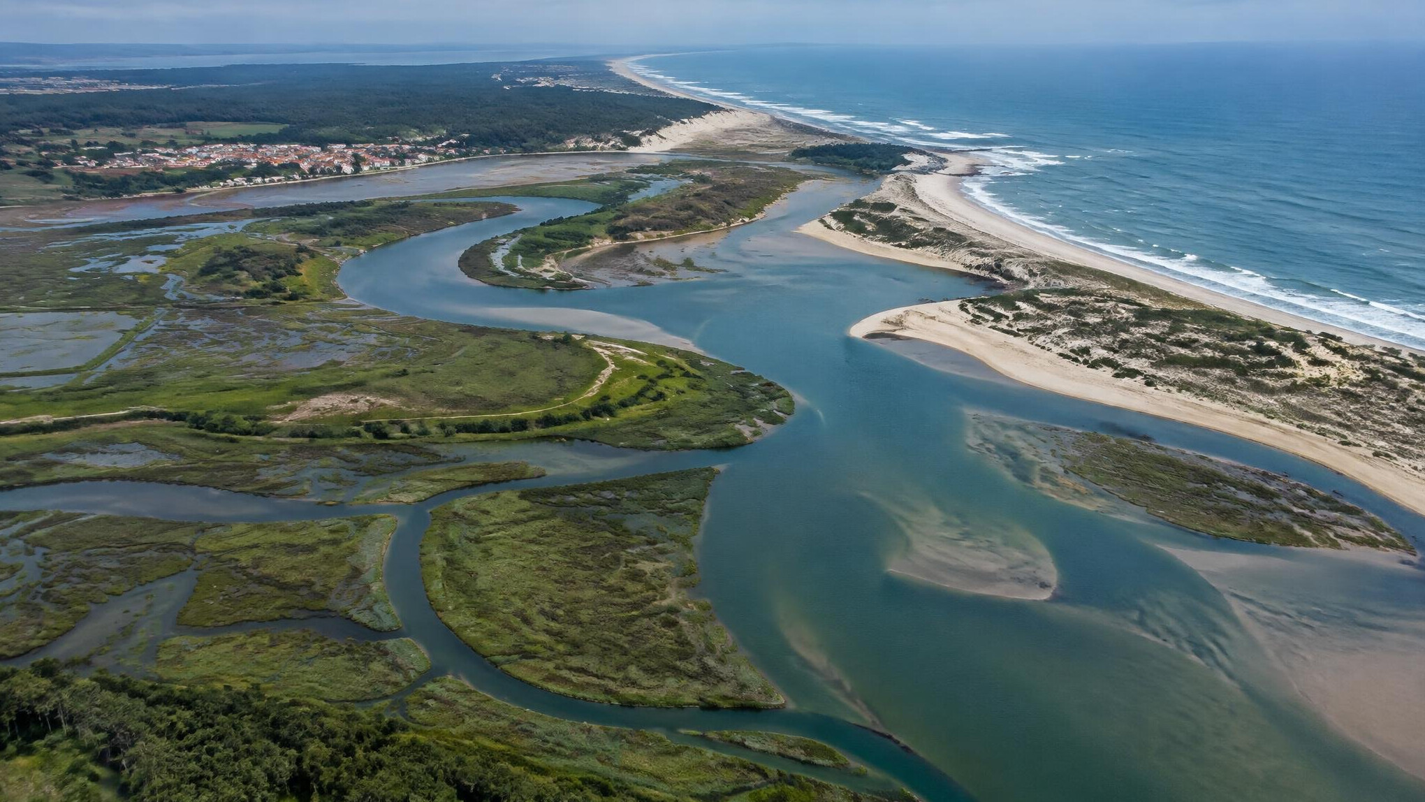 Aerial view of a river delta and coastline in Portugal