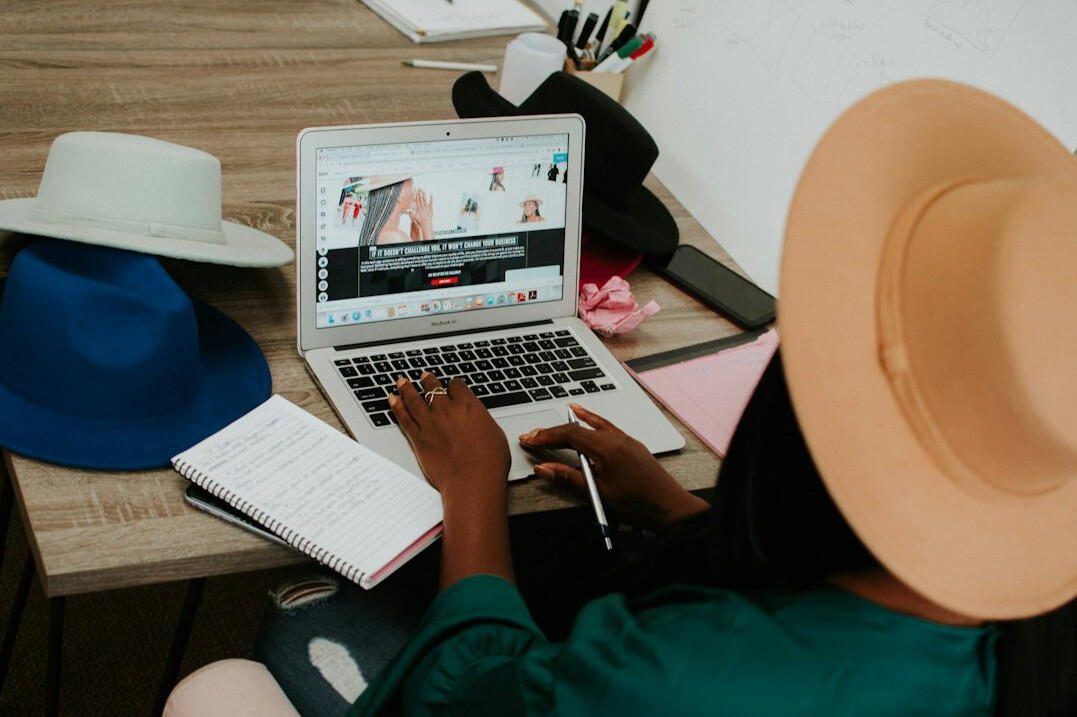 fashion designer working on laptop
